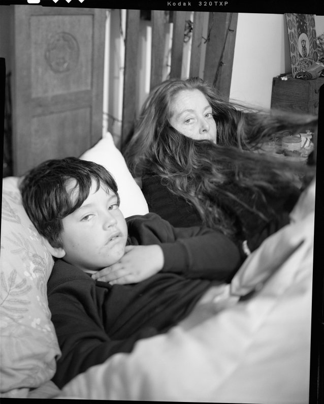 Dylan & Sarah in bed, 2024