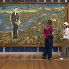 Visitors in the Power suits: The fit within the frame exhibition, May 2026, featuring Harold Thornton's Dr Brown and green Old Time Waltz 1983