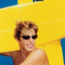 Boy with surfboard cross: David Rastovich Boy with surfboard cross: David Rastovich